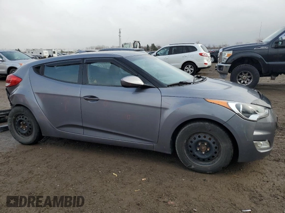 2012 Hyundai Veloster w/Black Int z VIN KMHTC6ADXCU025876, wystawiony jako Copart lot #50377835 z przebiegiem 185 181 mil mil oraz Czysty tytuł • Clean title. Historia ofert i sprzedaży dostępna na DreamBid. Obrazek 4.