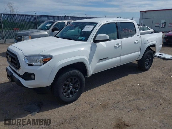 2023 Toyota Tacoma SR with VIN 3TMCZ5AN2PM642205, listed as a IAAI auction lot 42167945 with 10,595 mi miles and . Bid and sale history available at DreamBid. Image 2.