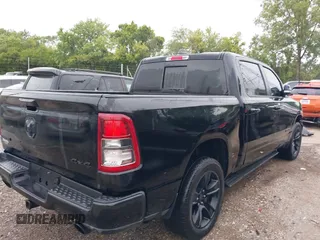 2020 Ram 1500 Big Horn with VIN 1C6SRFFT0LN216433, listed as a IAAI auction lot 40032077 with 102,298 mi miles. Bid and sale history available at carsss.com. Image 4.