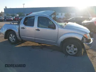 2006 Nissan Frontier SE z VIN 1N6AD07W66C470766, wystawiony jako IAAI lot #41023377 z przebiegiem Nie podano mil oraz . Historia ofert i sprzedaży dostępna na DreamBid. Obrazek 14.