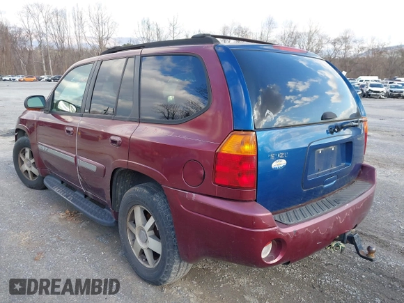 2004 GMC Envoy SLE with VIN 1GKDS13S342287315, listed as a IAAI auction lot 41486715 with 186,129 mi miles. Bid and sale history available at carsss.com. Image 6.