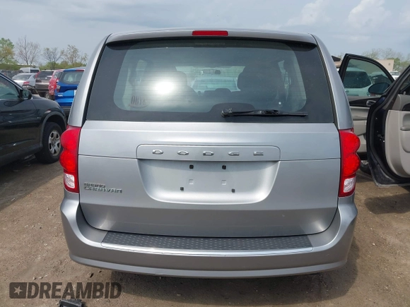 2016 Dodge Grand Caravan SE with VIN 2C4RDGBG5GR251689, listed as a IAAI auction lot 42149865 with 137,410 mi miles and . Bid and sale history available at DreamBid. Image 16.