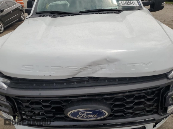 2023 Ford F-250 XL with VIN 1FT8W2BTXPEC34552, listed as a Copart auction lot 65428444 with 39,595 mi miles and Salvage title. Bid and sale history available at DreamBid. Image 11.