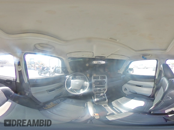 2007 Jeep Patriot Limited z VIN 1J8FF48W37D286057, wystawiony jako Copart lot #54796445 z przebiegiem 182 696 mil mil oraz Szkoda całkowita • Salvage title. Historia ofert i sprzedaży dostępna na DreamBid. Obrazek 14.