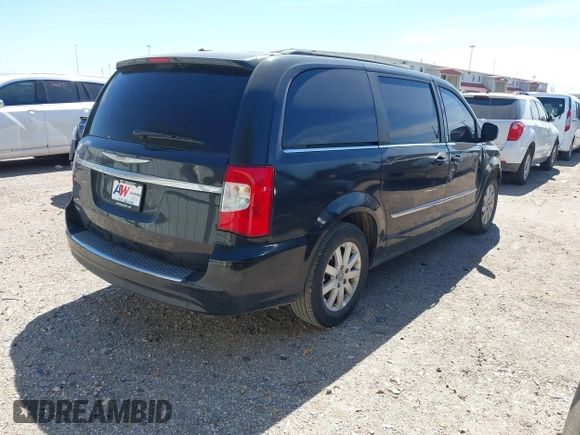 2013 Chrysler Town & Country Touring with VIN 2C4RC1BGXER216837, listed as a IAAI auction lot 41813424 with 216,395 mi miles and . Bid and sale history available at DreamBid. Image 4.
