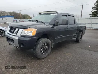 2014 Nissan Titan Pro-4X with VIN 1N6AA0EC3EN514744, listed as a Copart auction lot 80469314 with 191,780 mi miles and Salvage title. Bid and sale history available at DreamBid. Image 1.