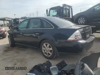 2009 Ford Taurus Limited with VIN 1FAHP25W59G124413, listed as a Copart auction lot 77771044 with 228,831 mi miles and Salvage Title. Bid and sale history available at carsss.com. Image 2.