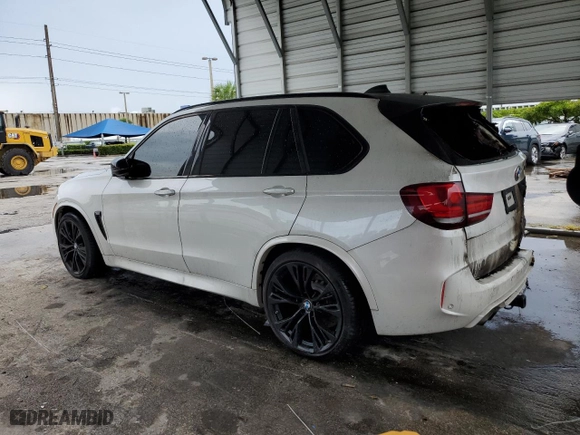 2015 BMW X5 M with VIN 5YMKT6C55F0C89468, listed as a Copart auction lot 75391074 with 0 mi miles and Salvage Title. Bid and sale history available at carsss.com. Image 2.
