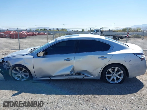 2014 Nissan Maxima S z VIN 1N4AA5APXEC450907, wystawiony jako IAAI lot #41998184 z przebiegiem 186 314 mil mil oraz . Historia ofert i sprzedaży dostępna na DreamBid. Obrazek 14.