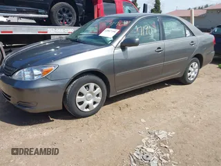 2004 Toyota Camry LE with VIN 4T1BE32K24U895575, listed as a IAAI auction lot 42067190 with 283,333 mi miles. Bid and sale history available at carsss.com. Image 2.