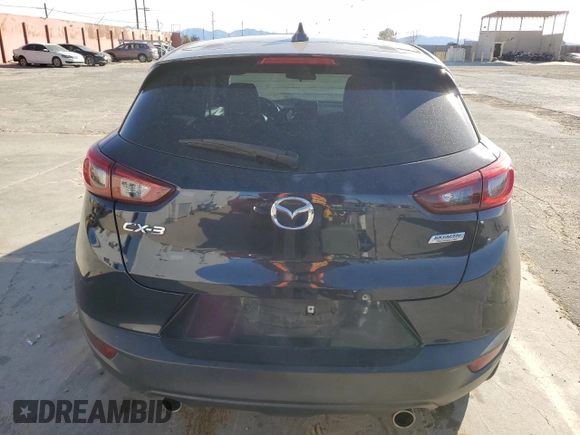 2017 Mazda CX-3 Touring z VIN JM1DKDC74H0165654, wystawiony jako Copart lot #41928295 z przebiegiem 173 567 mil mil oraz Szkoda całkowita • Salvage title. Historia ofert i sprzedaży dostępna na DreamBid. Obrazek 6.