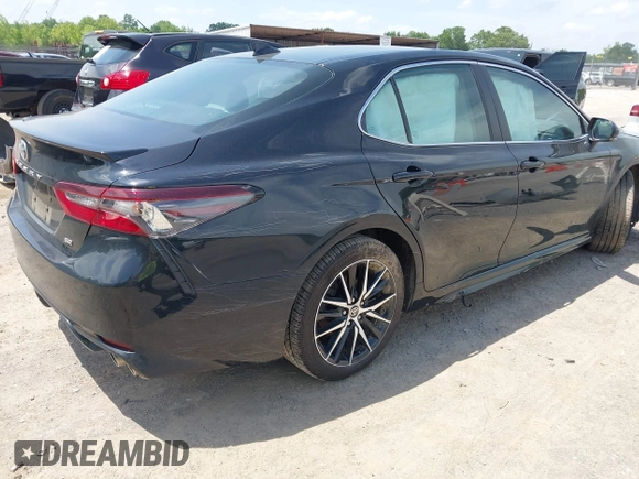 2023 Toyota Camry SE z VIN 4T1T11AK9PU721786, wystawiony jako IAAI lot #42279812 z przebiegiem 30 707 mil mil oraz . Historia ofert i sprzedaży dostępna na DreamBid. Obrazek 4.