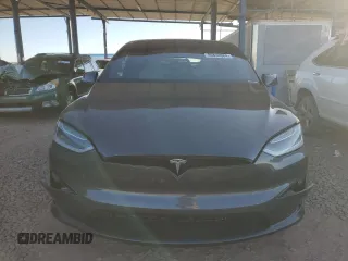 2023 Tesla Model X with VIN 7SAXCAE5XPF384061, listed as a Copart auction lot 86834084 with 6,974 mi miles and Salvage Title. Bid and sale history available at DreamBid. Image 5.