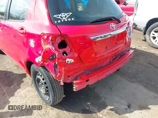 2013 Toyota Yaris L with VIN JTDKTUD35DD560686, listed as a IAAI auction lot 41702208 with 142,174 mi miles. Bid and sale history available at carsss.com. Image 6.