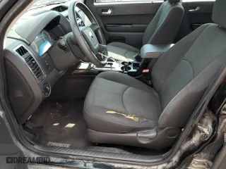 2010 Mazda Tribute Touring with VIN 4F2CY9C75AKM02945, listed as a Copart auction lot 67784674 with 134,363 mi miles and Salvage Title. Bid and sale history available at carsss.com. Image 7.