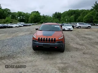 2016 Jeep Cherokee Trailhawk with VIN 1C4PJMBS2GW255368, listed as a Copart auction lot 59010305 with 105,667 mi miles and Salvage title. Bid and sale history available at DreamBid. Image 13.