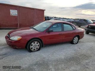 2002 Ford Taurus LX with VIN 1FAFP52U92A143857, listed as a Copart auction lot 77967554 with 120,097 mi miles and Salvage Title. Bid and sale history available at carsss.com. Image 1.