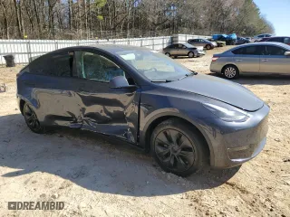 2025 Tesla Model Y Long Range with VIN 7SAYGDEE7SA345301, listed as a Copart auction lot 46693835 with 1,733 mi miles and Salvage Title. Bid and sale history available at carsss.com. Image 4.