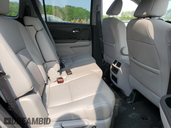 2020 Honda Pilot EX-L z VIN 5FNYF6H5XLB008097, wystawiony jako Copart lot #59329285 z przebiegiem Nie podano mil oraz Szkoda całkowita • Salvage title. Historia ofert i sprzedaży dostępna na DreamBid. Obrazek 11.