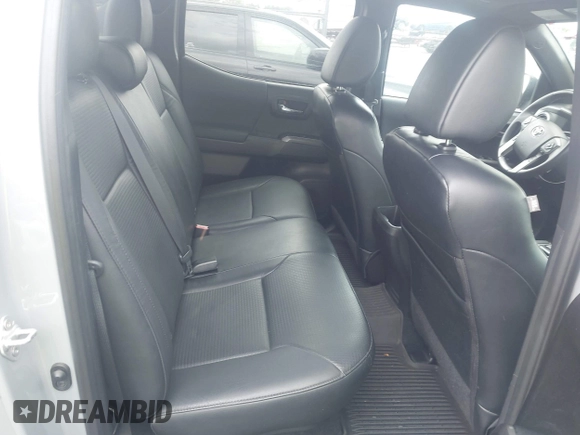 2021 Toyota Tacoma SR with VIN 5TFCZ5AN3MX258746, listed as a IAAI auction lot 42252967 with 62,095 mi miles and . Bid and sale history available at DreamBid. Image 8.
