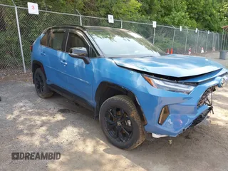 2022 Toyota RAV4 Hybrid XSE z VIN 2T3E6RFV2NW032835, wystawiony jako IAAI lot #42429819 z przebiegiem 67 101 mil mil oraz . Historia ofert i sprzedaży dostępna na DreamBid. Obrazek 1.
