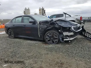 2024 BMW 5 Series 530i with VIN WBA43FJ04RCP70866, listed as a Copart auction lot 49156375 with 0 mi miles and Salvage Title. Bid and sale history available at carsss.com. Image 4.