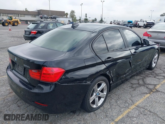 2014 BMW 3 Series 320i with VIN WBA3B1G57ENS80800, listed as a IAAI auction lot 42097683 with 152,924 mi miles. Bid and sale history available at carsss.com. Image 4.