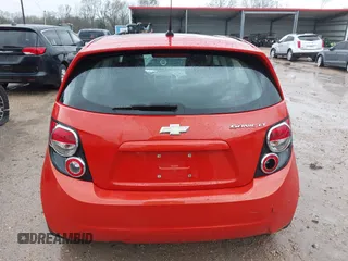 2013 Chevrolet Sonic LT with VIN 1G1JC6SHXD4139822, listed as a IAAI auction lot 41672289 with 87,899 mi miles. Bid and sale history available at carsss.com. Image 16.