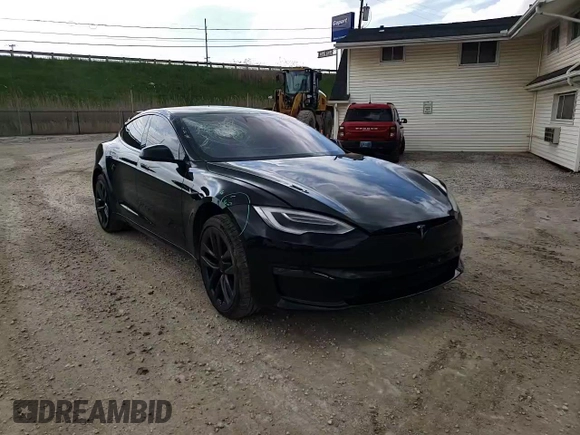 2021 Tesla Model S Plaid with VIN 5YJSA1E63MF451391, listed as a Copart auction lot 54821985 with 50,480 mi miles and Salvage title. Bid and sale history available at DreamBid. Image 13.