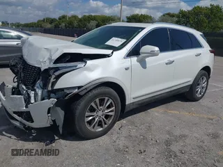 2020 Cadillac XT5 Premium Luxury FWD with VIN 1GYKNCRS7LZ129119, listed as a IAAI auction lot 41710878 with 52,575 mi miles and . Bid and sale history available at carsss.com. Image 2.