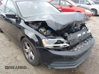 2015 Volkswagen Jetta S with VIN 3VW2K7AJ3FM277070, listed as a IAAI auction lot 42384814 with 122,107 mi miles and . Bid and sale history available at DreamBid. Image 14.