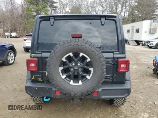 2024 Jeep Wrangler Rubicon X z VIN 1C4RJXR65RW143217, wystawiony jako Copart lot #49298355 z przebiegiem 21 819 mil mil oraz Szkoda całkowita • Salvage title. Historia ofert i sprzedaży dostępna na DreamBid. Obrazek 6.