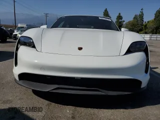 2021 Porsche Taycan z VIN WP0AA2Y15MSA17464, wystawiony jako Copart lot #52412815 z przebiegiem 27 136 mil mil oraz Szkoda całkowita • Salvage title. Historia ofert i sprzedaży dostępna na DreamBid. Obrazek 5.