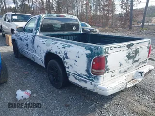 1998 Dodge Dakota SLT z VIN 1B7FL26X7WS586596, wystawiony jako IAAI lot #41745358 z przebiegiem 173 950 mil mil oraz . Historia ofert i sprzedaży dostępna na DreamBid. Obrazek 3.