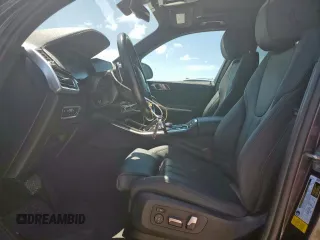 2020 BMW X5 sDrive40i with VIN 5UXCR4C01L9B35432, listed as a Copart auction lot 54367635 with 63,077 mi miles and Salvage title. Bid and sale history available at DreamBid. Image 7.