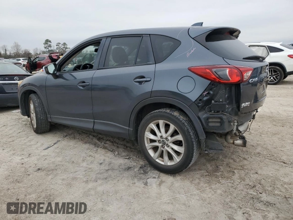 2013 Mazda CX-5 Grand Touring with VIN JM3KE2DE7D0129491, listed as a Copart auction lot 44795725 with 124,487 mi miles and Salvage Title. Bid and sale history available at carsss.com. Image 2.
