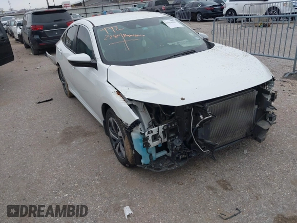 2020 Honda Civic LX with VIN 19XFC2F62LE021811, listed as a IAAI auction lot 41591466 with 75,797 mi miles and . Bid and sale history available at DreamBid. Image 1.