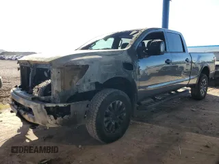 2023 Nissan Titan Pro-4X z VIN 1N6AA1FB9PN104450, wystawiony jako Copart lot #73206194 z przebiegiem Nie podano mil oraz Szkoda całkowita • Salvage title. Historia ofert i sprzedaży dostępna na DreamBid. Obrazek 1.