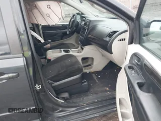 2012 Dodge Grand Caravan SXT with VIN 2C4RDGCG8CR242235, listed as a IAAI auction lot 41922083 with 124,306 mi miles and . Bid and sale history available at DreamBid. Image 5.