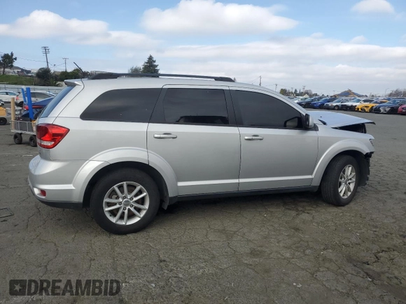 2014 Dodge Journey SXT with VIN 3C4PDCBG5ET227189, listed as a Copart auction lot 88994355 with 166,989 mi miles and Salvage Title. Bid and sale history available at carsss.com. Image 3.