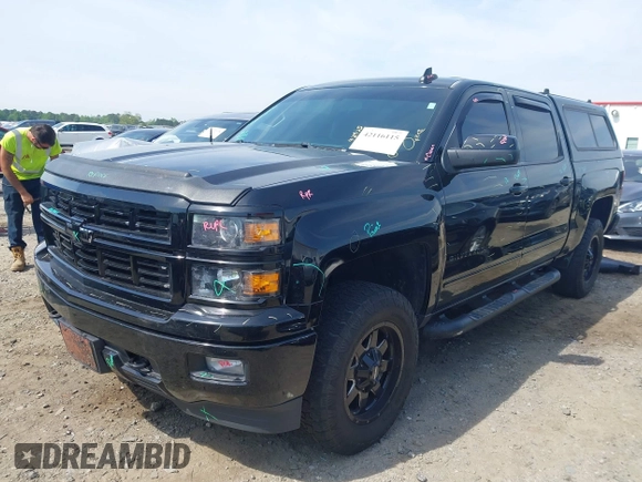 2015 Chevrolet Silverado 1500 LT with VIN 3GCUKREC5FG515521, listed as a IAAI auction lot 42116115 with 146,615 mi miles and . Bid and sale history available at DreamBid. Image 2.