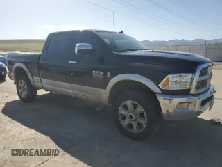 2014 Ram 2500 Laramie with VIN 3C6UR5FL2EG320582, listed as a Copart auction lot 52282625 with 216,745 mi miles and Salvage title. Bid and sale history available at DreamBid. Image 4.