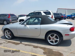 2002 Mazda MX-5 Miata Cloth z VIN JM1NB353020225252, wystawiony jako IAAI lot #42303820 z przebiegiem 194 549 mil mil oraz . Historia ofert i sprzedaży dostępna na DreamBid. Obrazek 14.