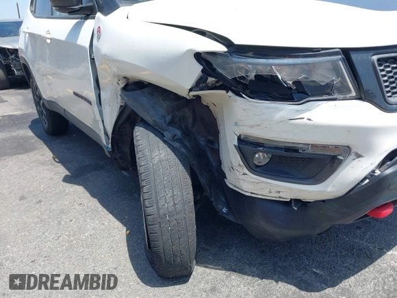 2020 Jeep Compass Trailhawk z VIN 3C4NJDDB5LT248662, wystawiony jako IAAI lot #42574553 z przebiegiem 28 118 mil mil oraz . Historia ofert i sprzedaży dostępna na DreamBid. Obrazek 6.