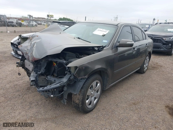 2009 Kia Optima LX with VIN KNAGE228X95299444, listed as a IAAI auction lot 41953241 with 201,170 mi miles. Bid and sale history available at carsss.com. Image 6.