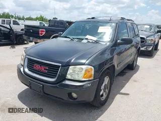 2005 GMC Envoy SLE with VIN 1GKDS13SX52373187, listed as a IAAI auction lot 42434190 with 112,965 mi miles and . Bid and sale history available at DreamBid. Image 2.
