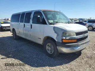 2005 Chevrolet Express Passenger with VIN 1GAHG39U051232615, listed as a Copart auction lot 73574264 with 207,303 mi miles and Salvage title. Bid and sale history available at DreamBid. Image 4.