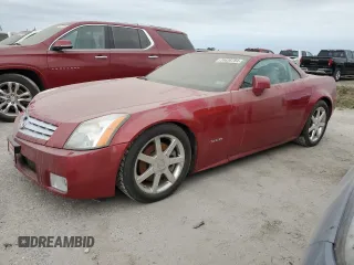 2005 Cadillac XLR z VIN 1G6YV34A855601016, wystawiony jako Copart lot #74436784 z przebiegiem Nie podano mil oraz Szkody całkowita. Historia ofert i sprzedaży dostępna na DreamBid. Obrazek 1.