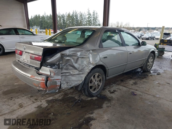 1998 Toyota Camry LE z VIN JT2BF28K1W0109514, wystawiony jako IAAI lot #41610102 z przebiegiem 161 266 mil mil oraz . Historia ofert i sprzedaży dostępna na DreamBid. Obrazek 4.