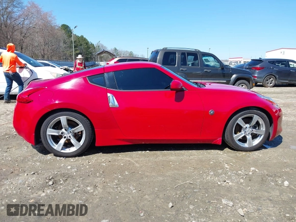 2009 Nissan 370Z Touring with VIN JN1AZ44E69M405179, listed as a IAAI auction lot 41762303 with 132,853 mi miles and . Bid and sale history available at DreamBid. Image 14.